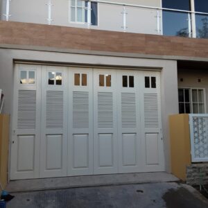 pintu garasi surabaya, pintu garasi besi, pintu garasi kaca, pintu garasi sliding